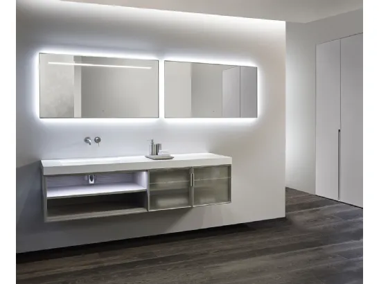 Mobile da bagno sospeso con ante in vetro Decorflou reflecting chiaro e struttura in Rovere Pietra Air di Casabath