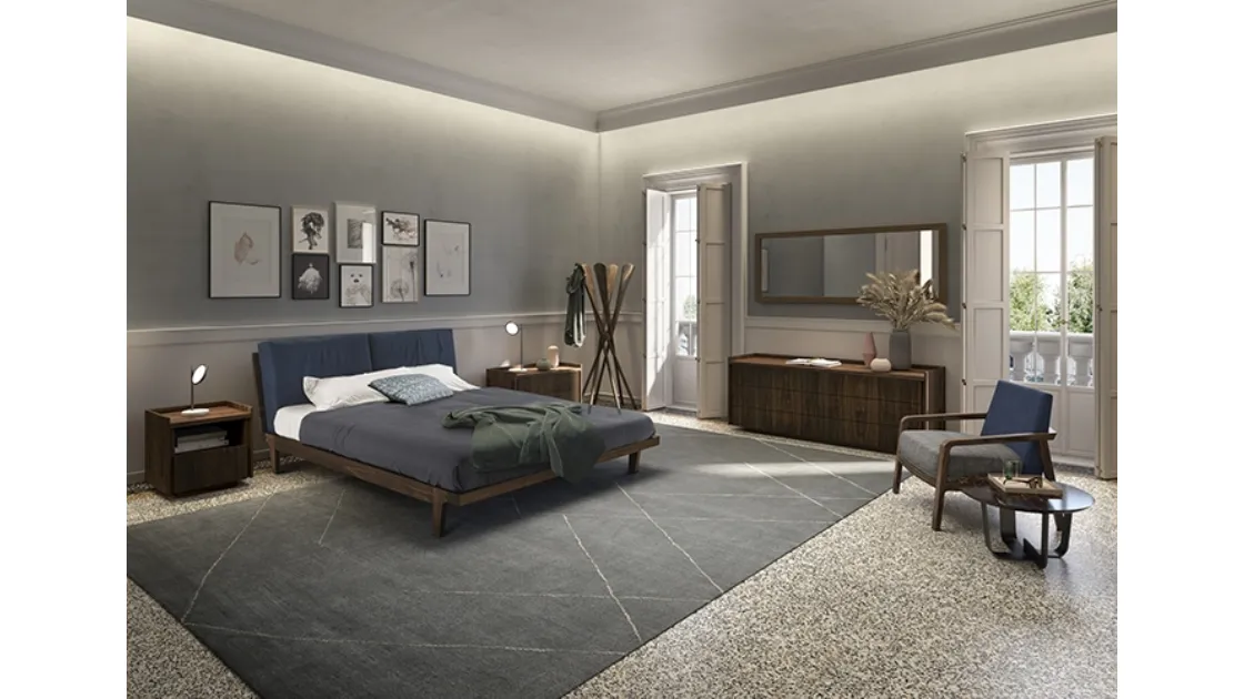 Letto con testiera Revo Soft Bed interamente realizzato in legno massello dove due cuscini in tessuto imbottito ne aumentano il comfort di Riva1920